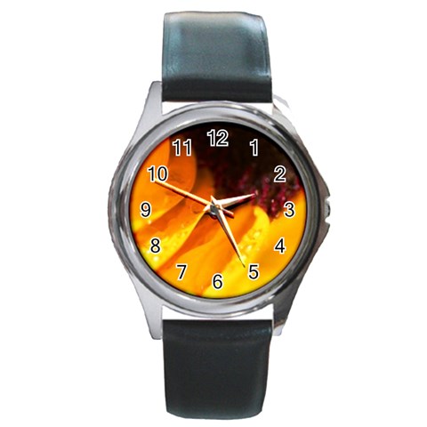 Wet Yellow Flowers 3  Round Metal Watch from UrbanLoad.com Front